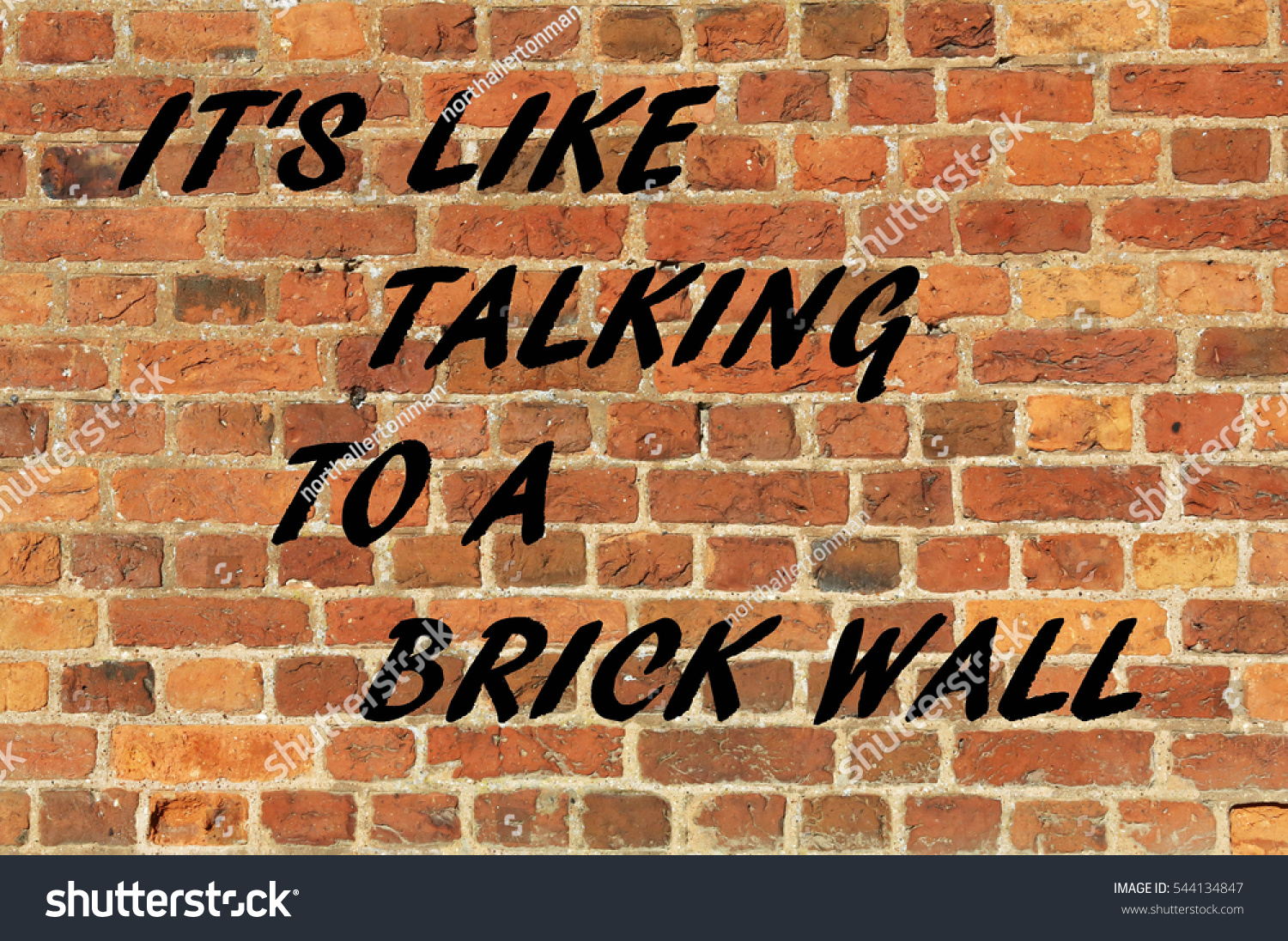 stock-photo-brick-wall-with-an-it-s-just-like-talking-to-a-brick-wall-concept-544134847.jpg