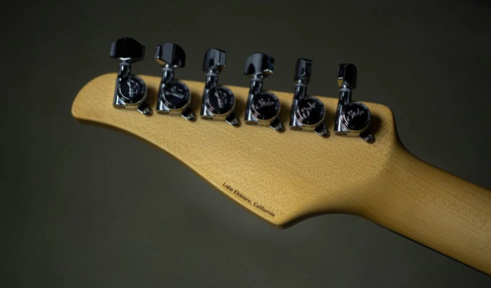 suhr lake elsinore california new engraving on the back of suhr headstocks.webp