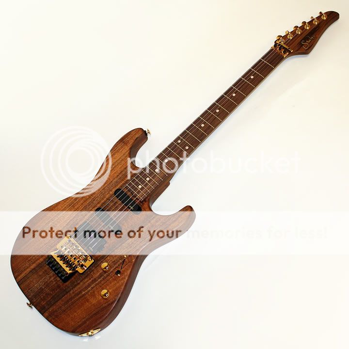 Suhr_RebBeach_Koa_13457_FrontFull.jpg